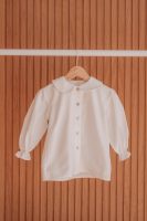 Camisa de criança em algodão de gola redonda