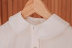 Camisa de criança em algodão de gola redonda
